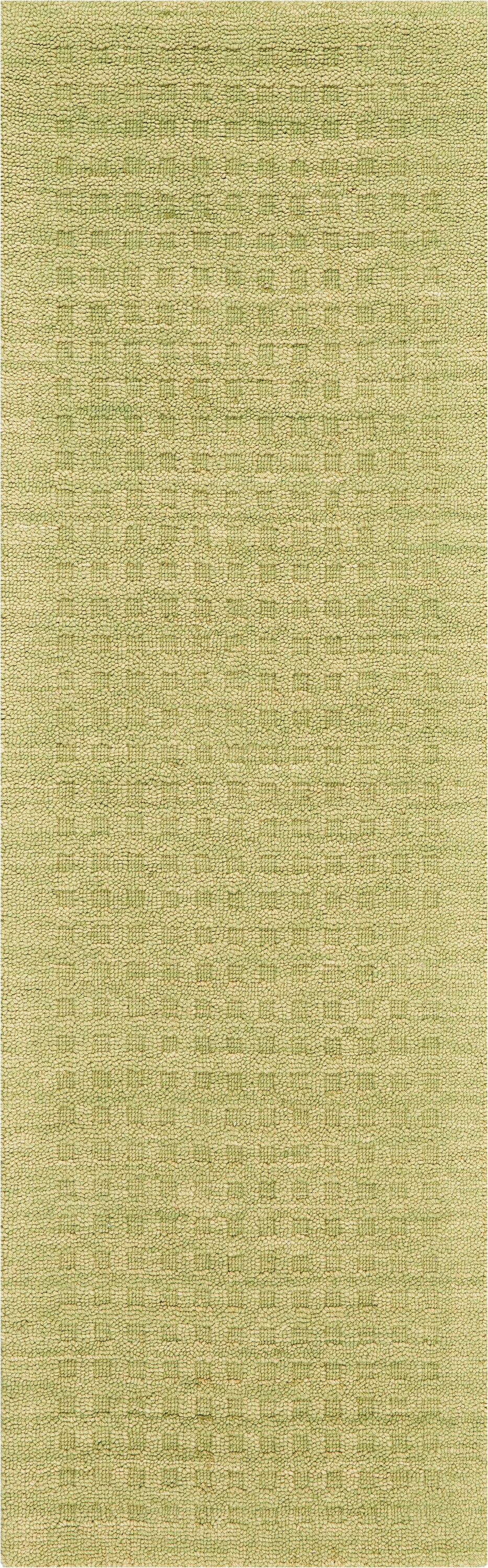 Close-up of lime-green loop-pile rug texture; soft woven fabric with tight uniform loops for casual home décor.
