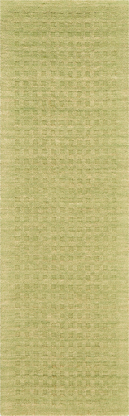 Close-up of lime-green loop-pile rug texture; soft woven fabric with tight uniform loops for casual home décor.