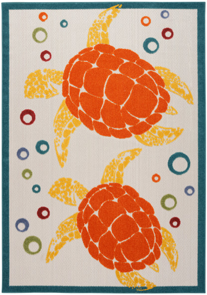 Teal-bordered decorative rug featuring two orange sea turtles, yellow fins, and colorful ring motifs on a pale background.