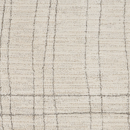 Cream rug with light brown grid lines forming squares; soft woven texture, neutral plaid style.