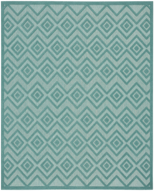 Teal geometric rug with a diamond chevron pattern and a darker border.