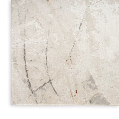 Beige abstract-pattern rug close-up with cream tones, light gray lines and subtle rust accents; soft textured weave.