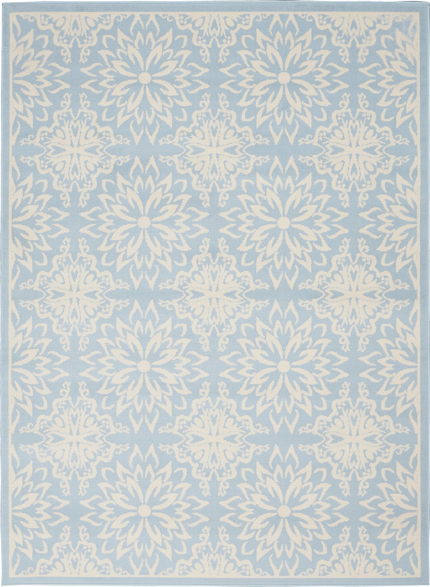 Blue area rug with white damask medallions, pale border & repeating floral pattern for living room decor.