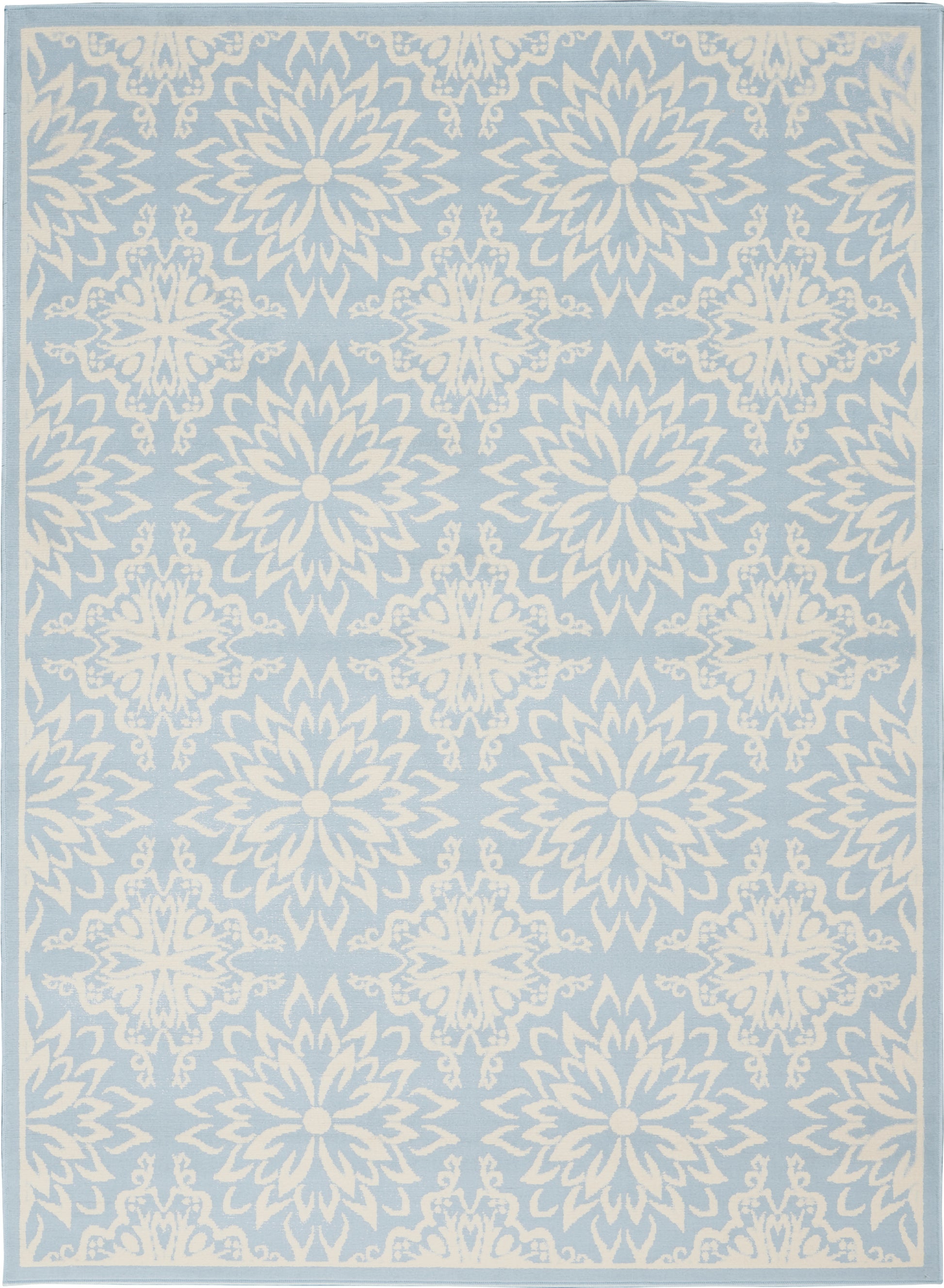 Blue area rug with white damask medallions, pale border & repeating floral pattern for living room decor.