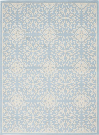 Blue area rug with white damask medallions, pale border & repeating floral pattern for living room decor.