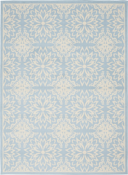 Blue area rug with white damask medallions, pale border & repeating floral pattern for living room decor.