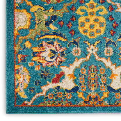 Turquoise oriental area rug border with ornate floral medallion in yellow, orange, cream, pink, blue; woven throw rug.