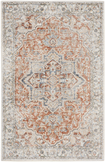Rectangular oriental rug with a distressed copper-orange field and blue-gray medallion on an ivory border; vintage Persian-inspired.