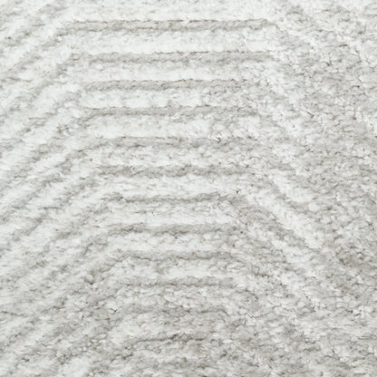 Light gray & white shag rug (Vintage 5' x 7') with a raised chevron geometric pattern & plush texture.