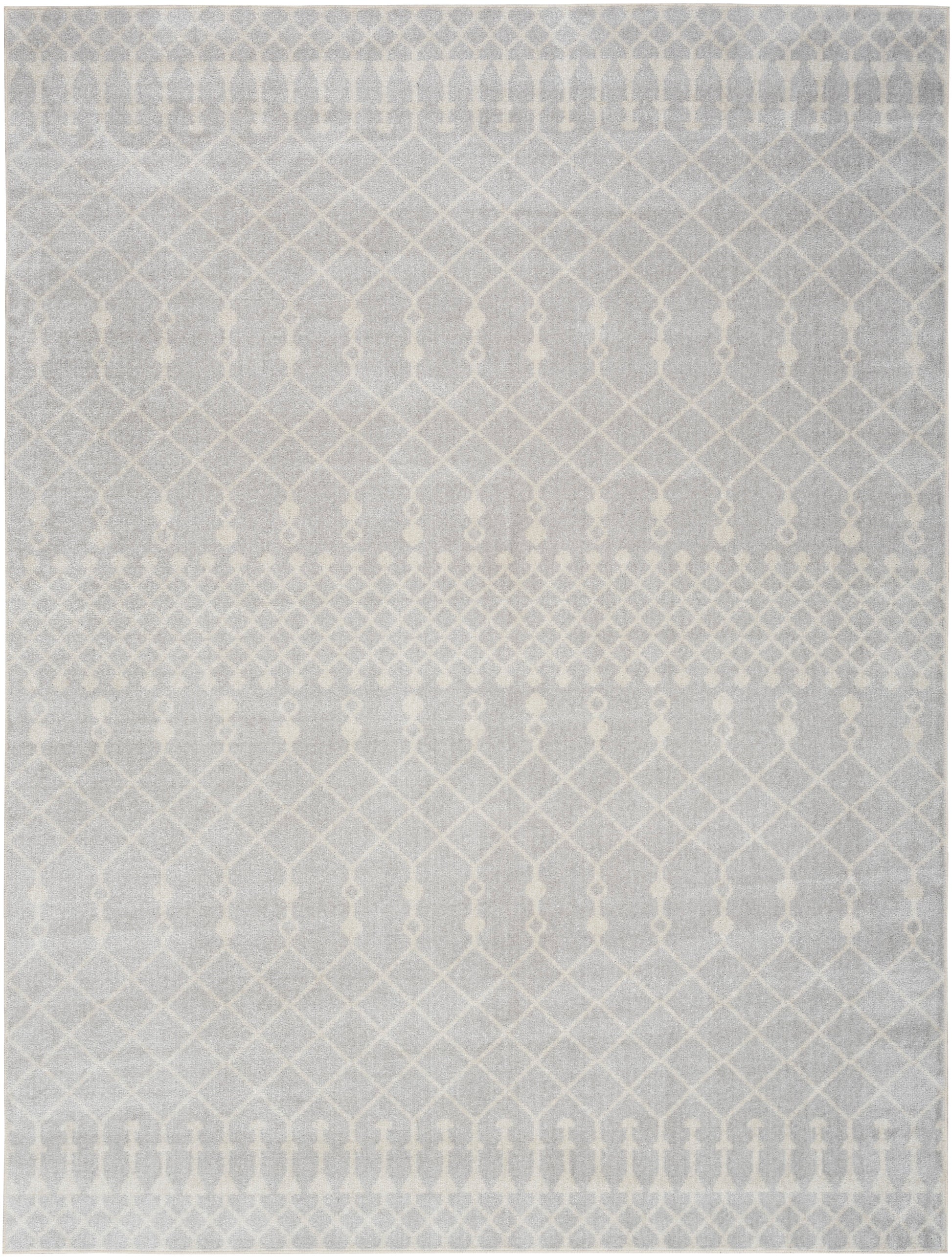 Soft gray woven rug with ivory geometric lattice & diamond pattern; subtle, modern decor.