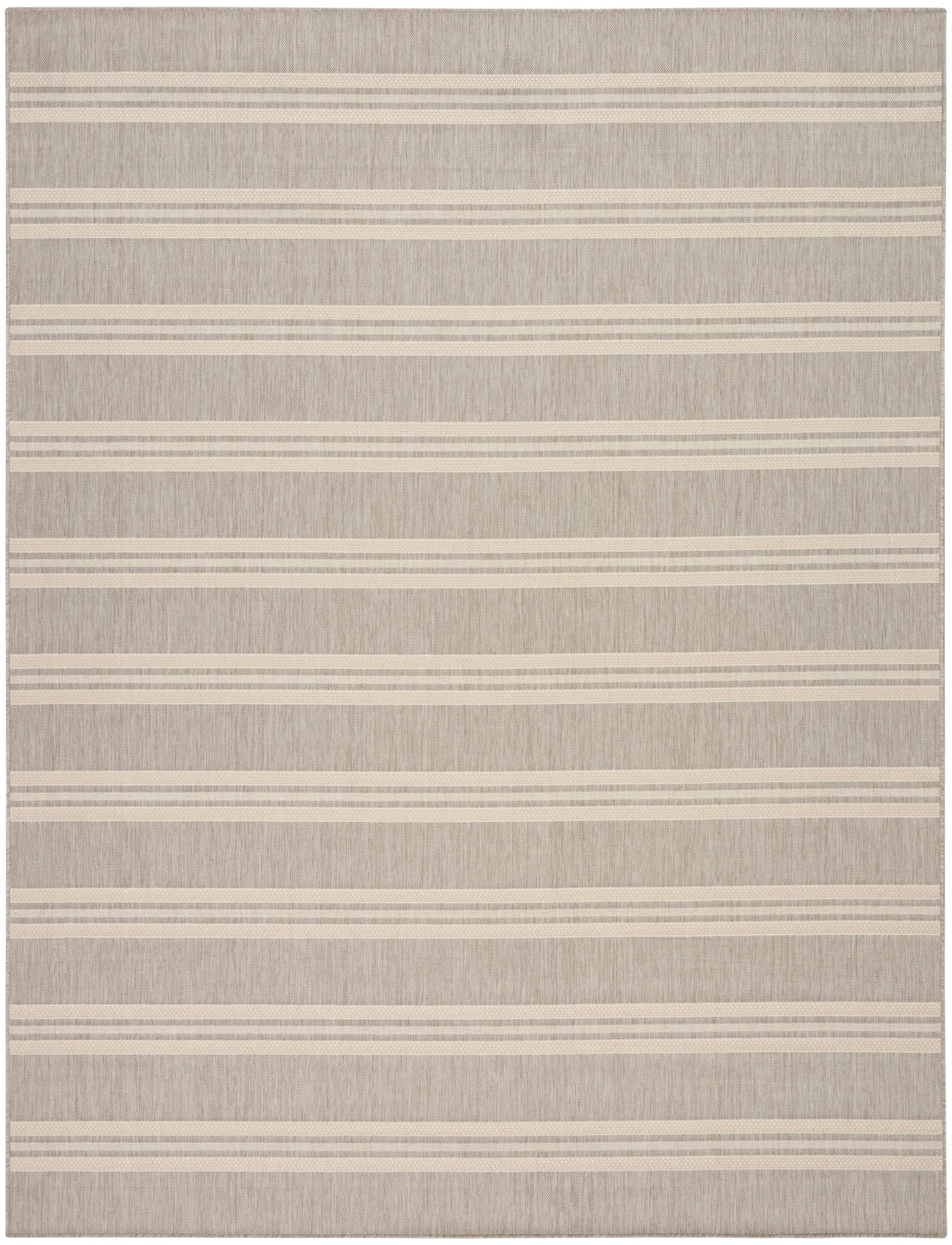 Beige textured rug with cream horizontal stripes; flat-weave, neutral coastal style.