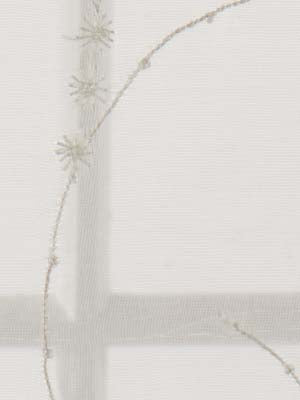 Cream drapery fabric with a subtle gray cross grid and curling vine with tiny leaves.