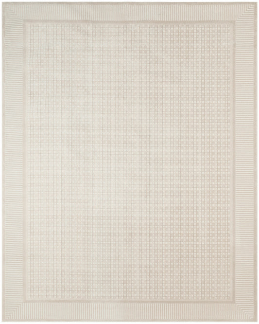 Beige rectangular rug with subtle grid weave and ribbed border; neutral living room accessory.