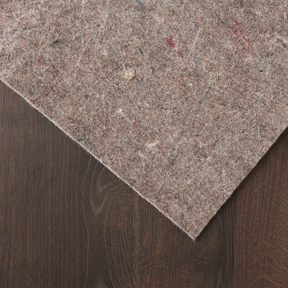 Brown speckled rug runner on dark wood surface; soft, textured fabric.