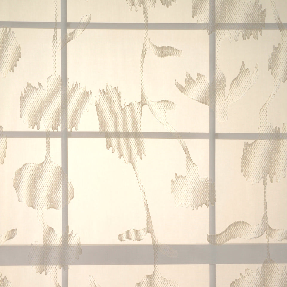 Beige damask floral fabric with a pale cream background, suitable for drapery.