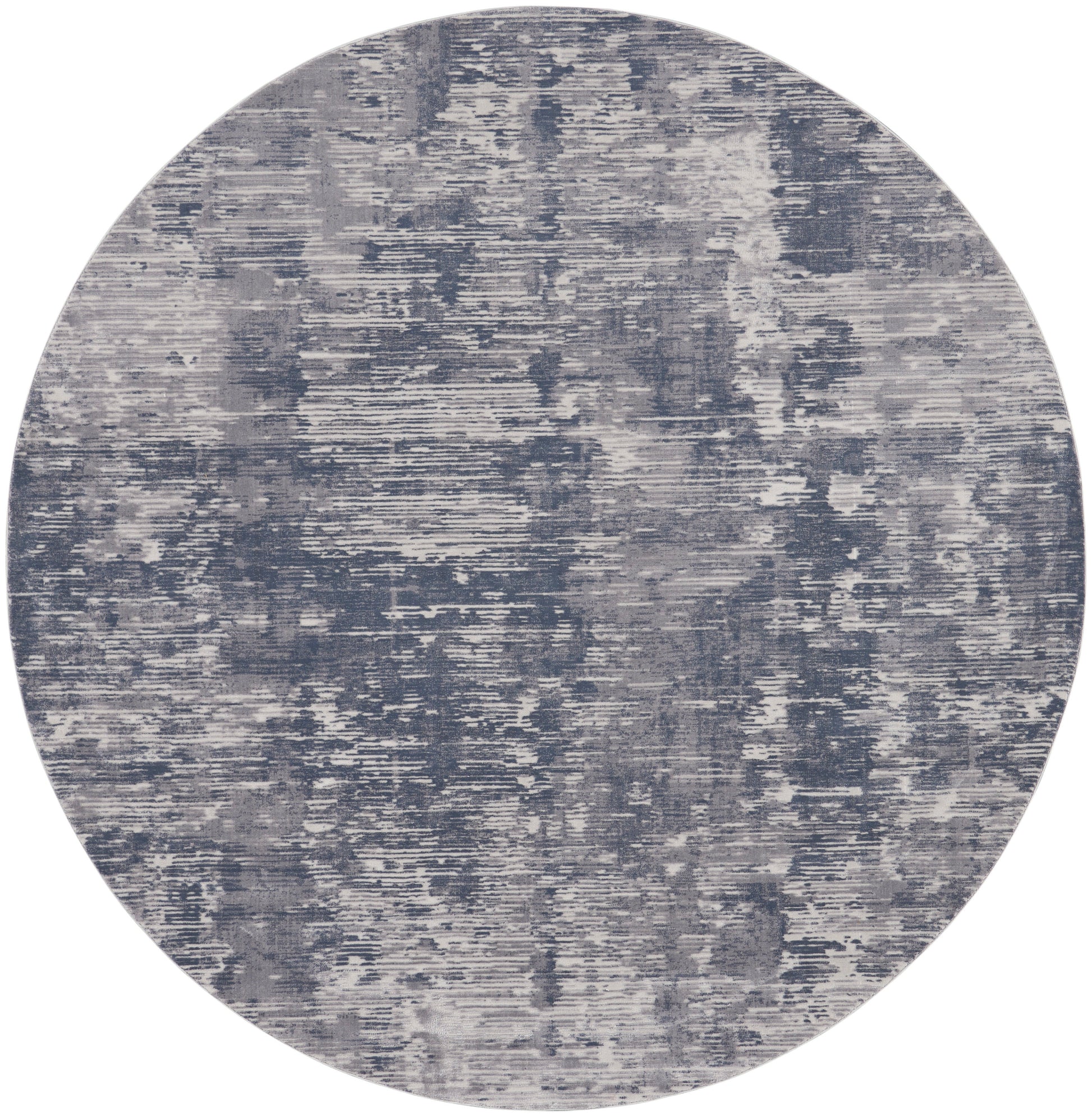 Round blue-gray rug with a distressed abstract pattern; modern, versatile home decor.
