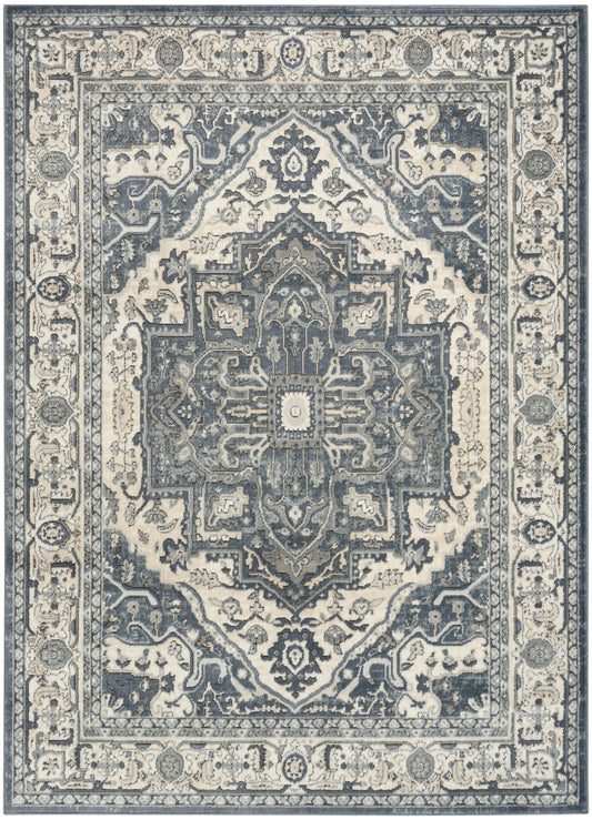 Blue and ivory Persian-style area rug with intricate central medallion, floral borders, rectangular shape.