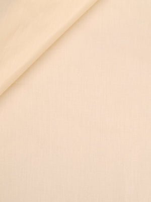 Cream beige fabric with a diagonal fold, smooth texture and fine weave.