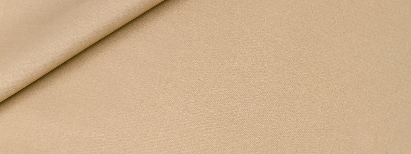 Taupe fabric with a top-left folded corner; smooth texture, multipurpose for apparel, upholstery or crafts.