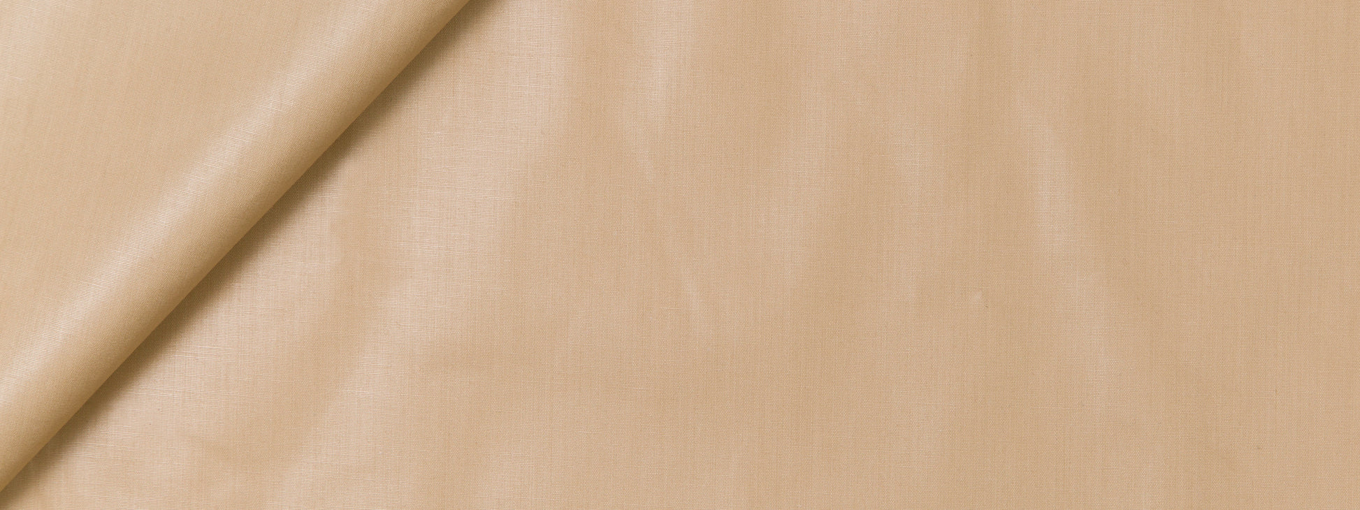 Mustard fabric with a diagonal fold and smooth texture, suitable for clothing or home decor.