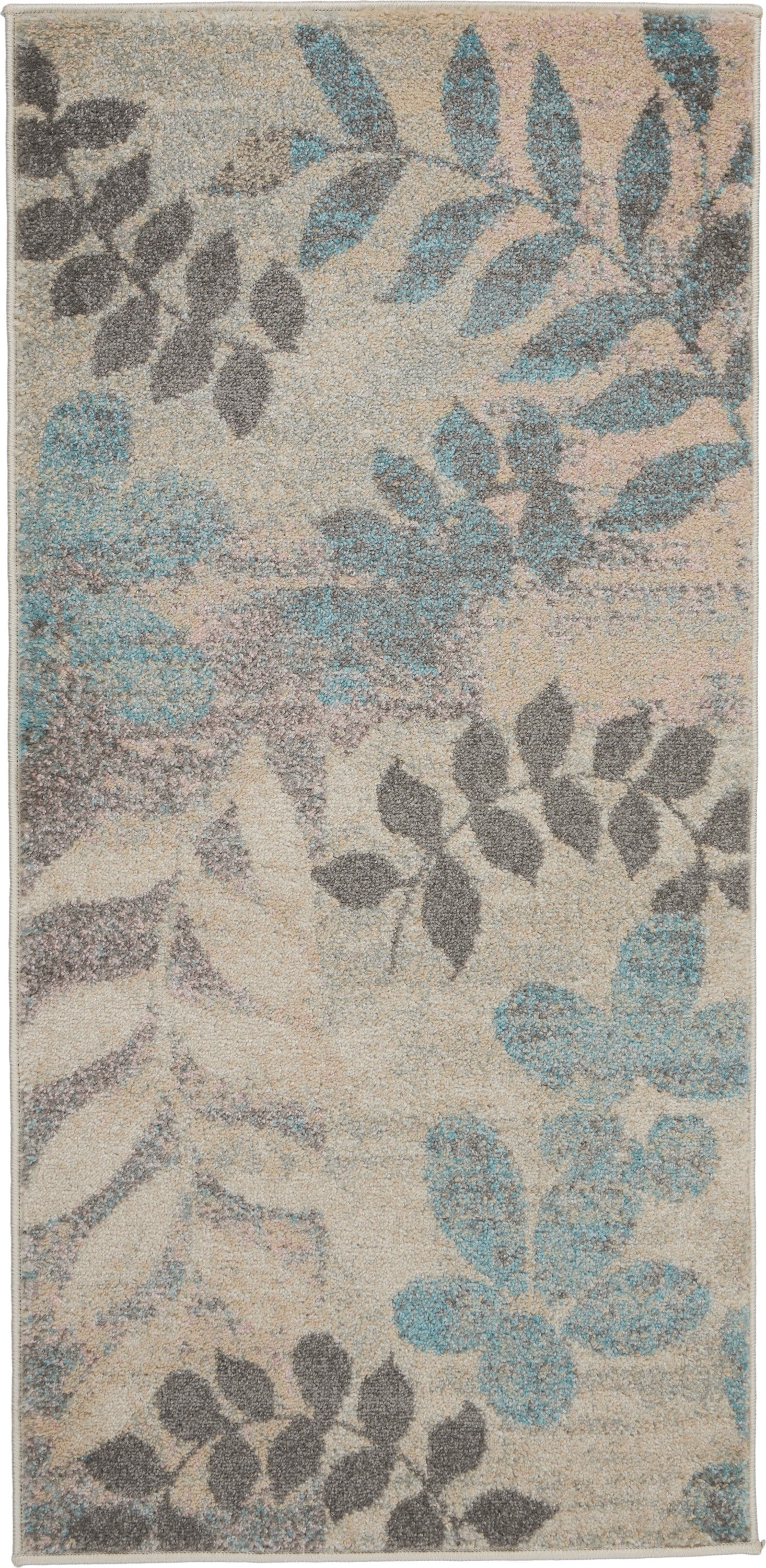 Beige area rug with blue teal and gray floral leaf pattern; plush loop pile.
