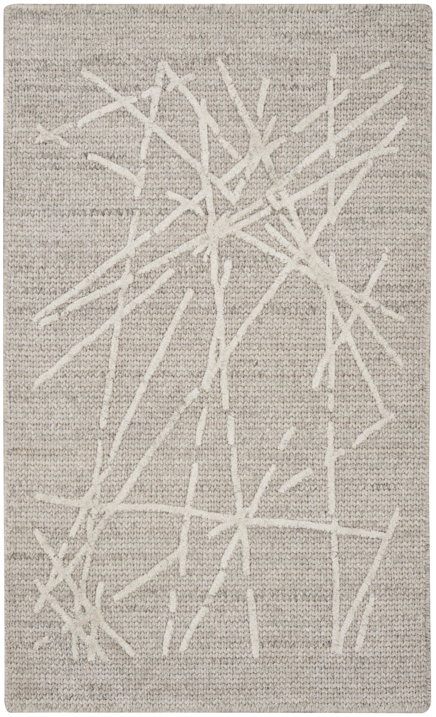 Neutral beige woven rug with white branch-like lines; contemporary minimalist living room rug.