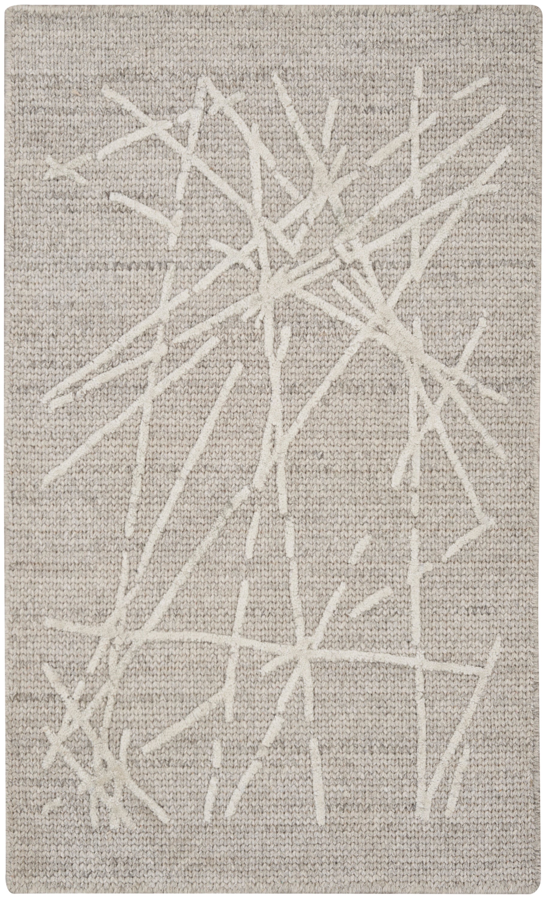 Neutral beige woven rug with white branch-like lines; contemporary minimalist living room rug.