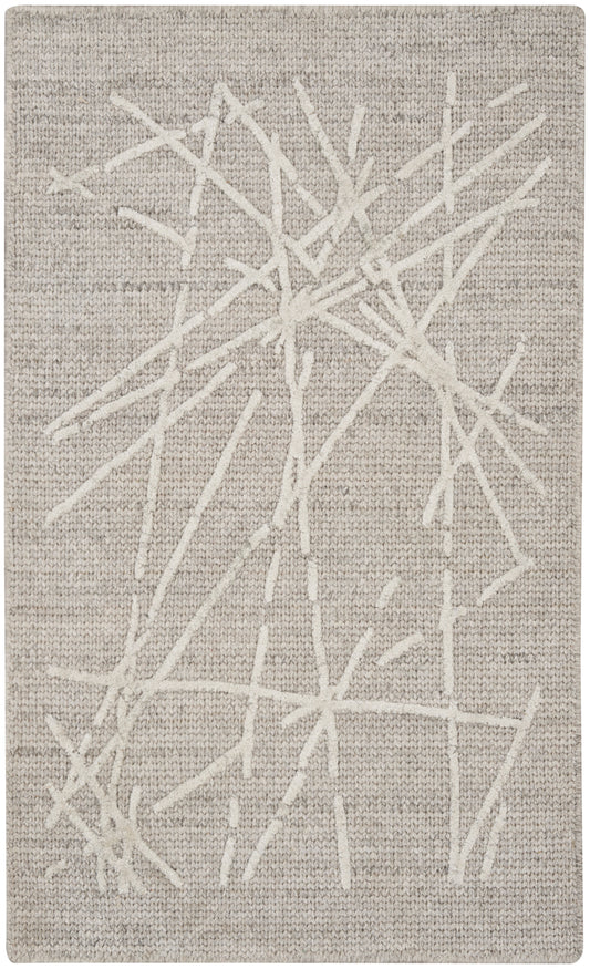 Neutral beige woven rug with white branch-like lines; contemporary minimalist living room rug.