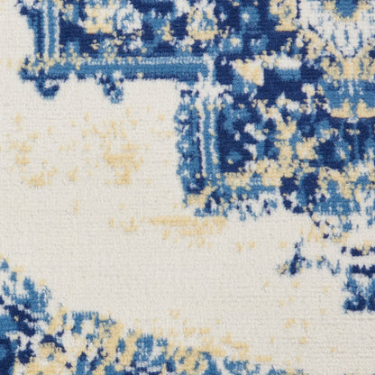 Abstract blue and yellow pattern rug with cream base; modern textured woven area rug.