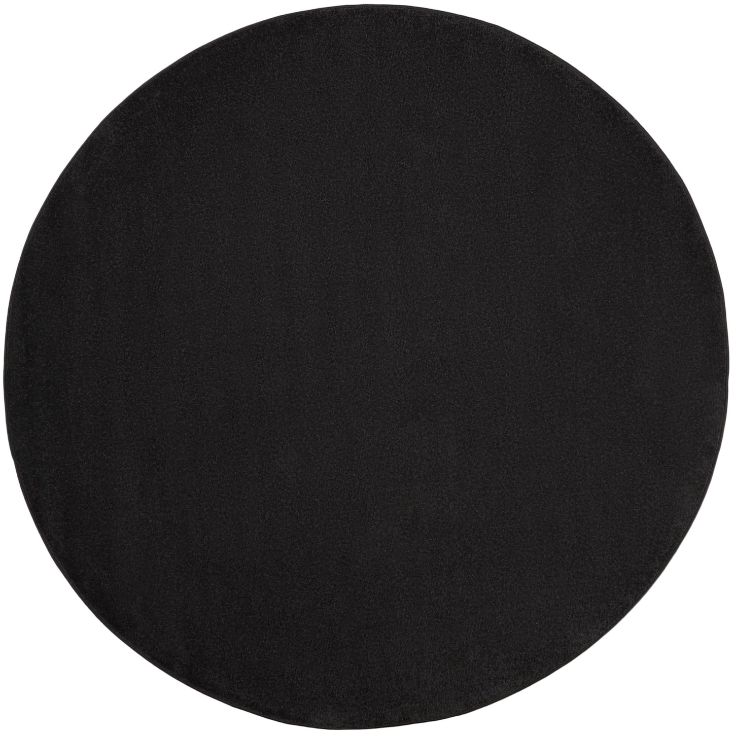 Round black felt placemat with soft texture for dining or table decor.