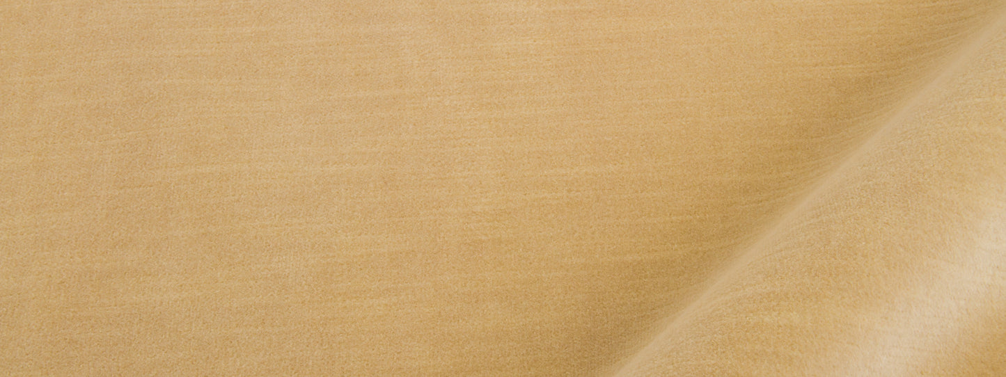 Beige linen-like fabric close-up with diagonal fold and subtle weave texture.