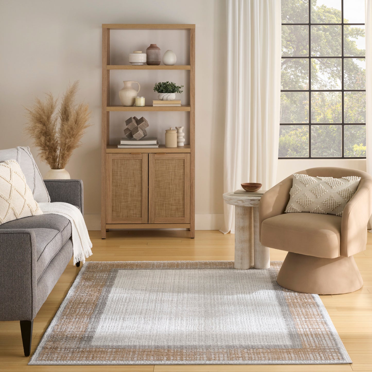 Neutral-toned rug in a living room.