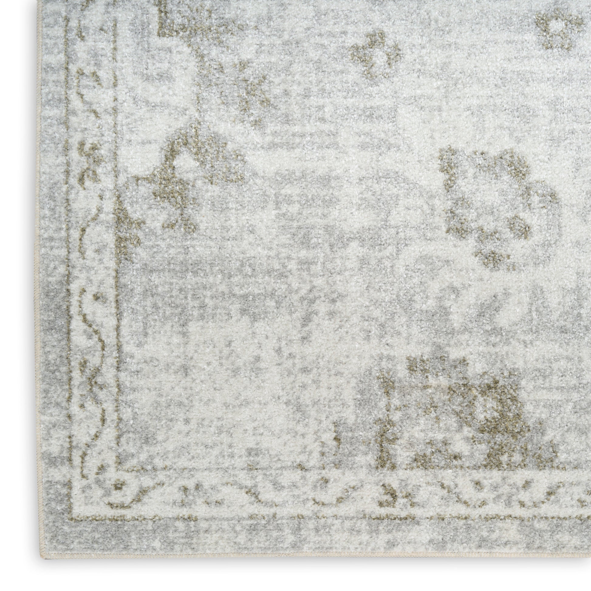 Soft gray distressed rug runner with a vintage floral motif and decorative border; plush and versatile for living rooms.