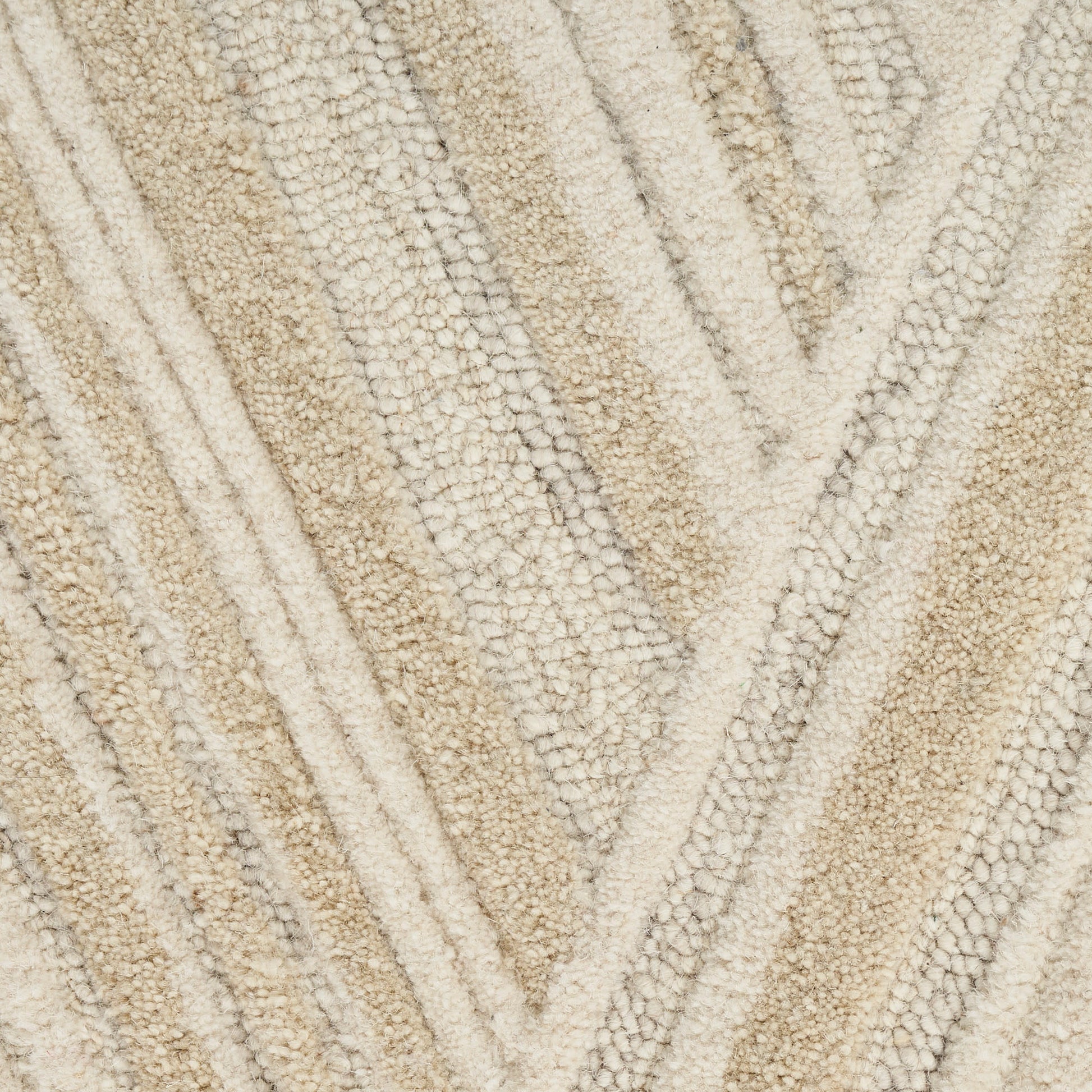 Beige textured rug with cream and tan chevron stripes, loop pile for cozy neutral home decor.