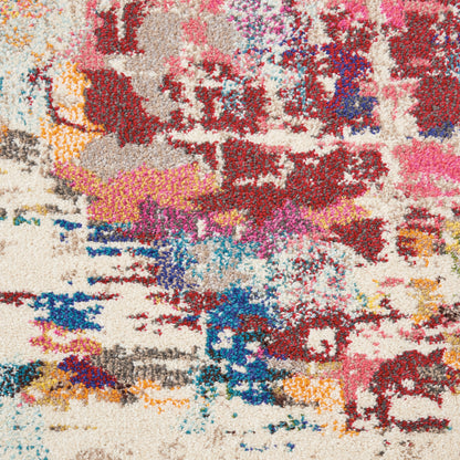 Shaggy abstract area rug with plush pile in cream background and splashes of red, pink, blue, yellow and orange.