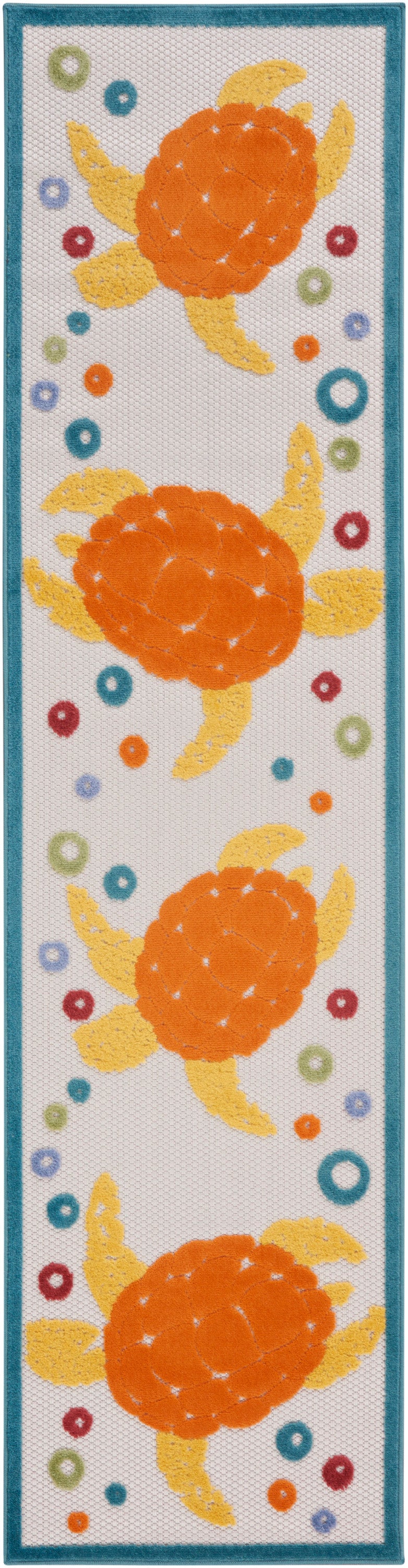 Rectangular teal-bordered coastal sea turtle rug runner with repeating orange sea turtles, yellow fins, and multicolored circles on a white textured background.