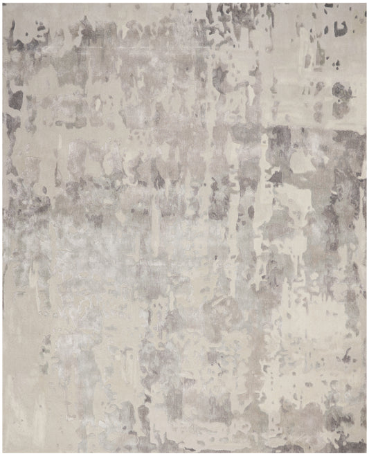 Neutral beige-gray abstract distressed rug, rectangular, soft low-pile, modern living room decor.