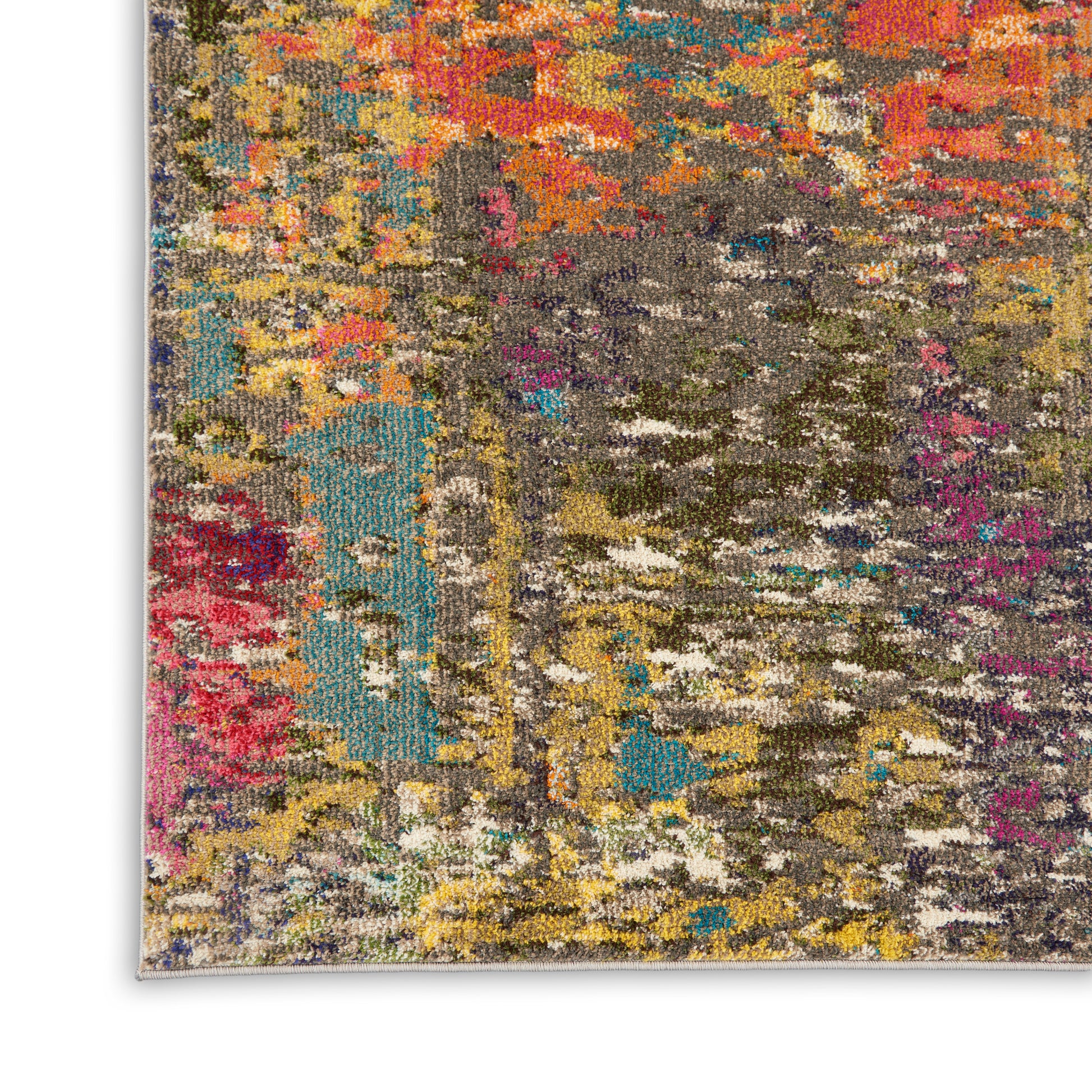 Colorful abstract area rug with a distressed multicolor pattern - greys, yellows, pinks, teal and orange accents.