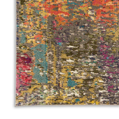 Colorful abstract area rug with a distressed multicolor pattern - greys, yellows, pinks, teal and orange accents.