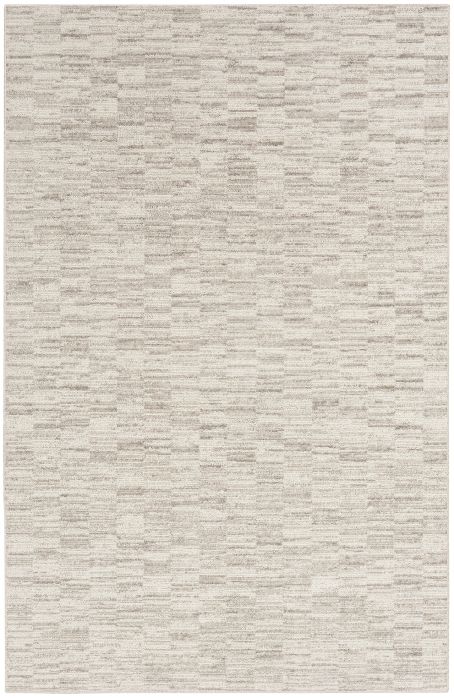 Beige rectangular woven rug with soft texture and subtle tonal streaks; ideal neutral accent.