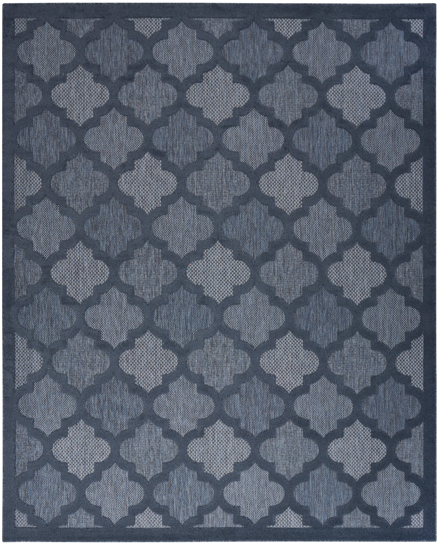 Navy blue rug with a repeating light-blue trellis pattern and a textured woven surface.