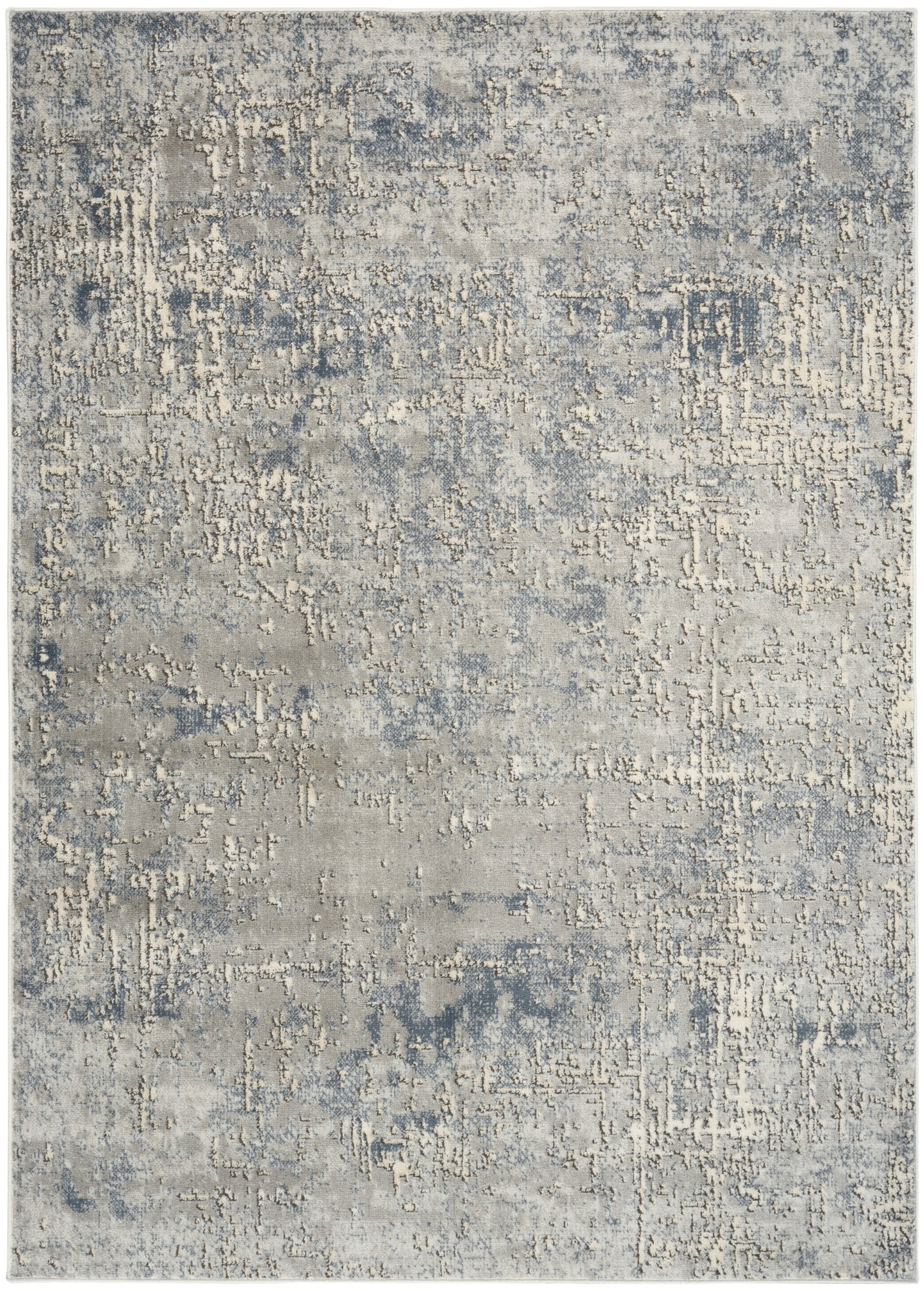Rectangular blue-gray distressed abstract area rug with beige highlights; contemporary living room style.