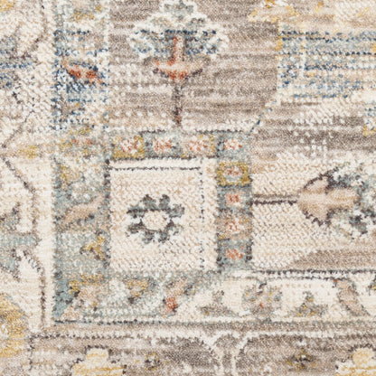 Beige vintage-area rug with muted blue & yellow accents; ornate geometric & floral patterns.