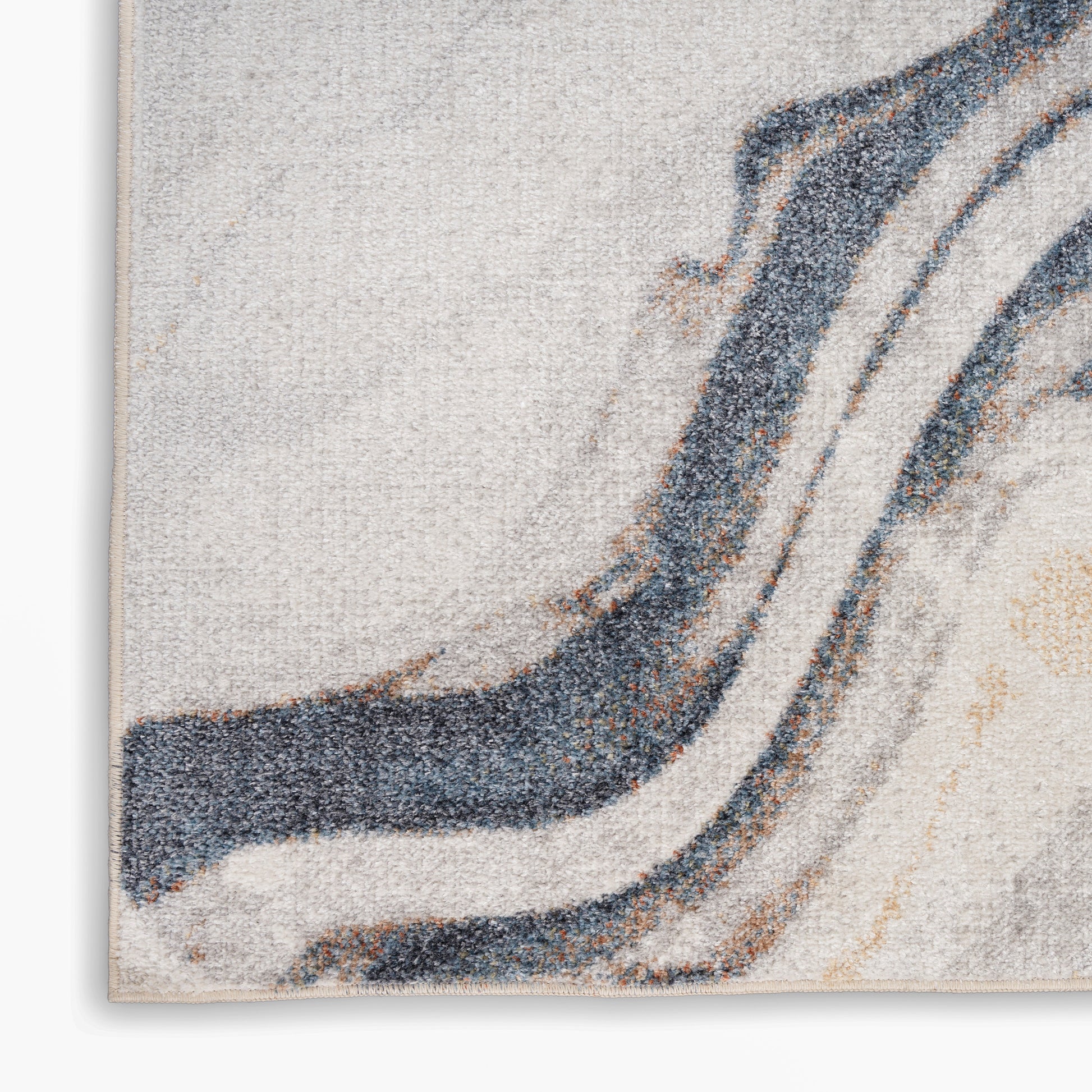 Textured abstract area rug with beige, cream, gray & navy wavy stripes; boucle pile, modern living room accent.