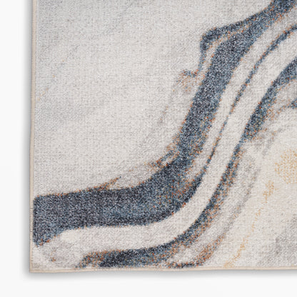 Textured abstract area rug with beige, cream, gray & navy wavy stripes; boucle pile, modern living room accent.