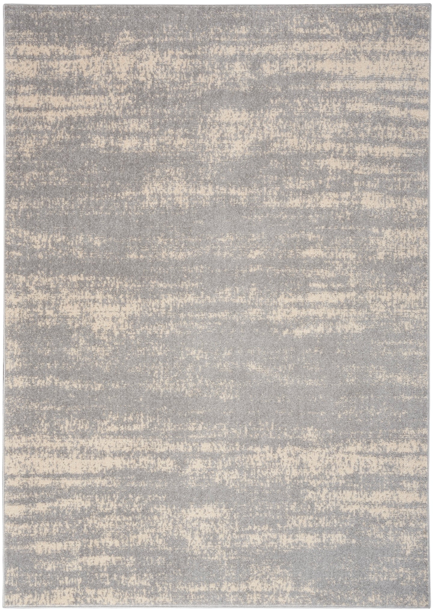 Rectangular grey and beige abstract-pattern rug; soft low-pile, modern living room decor.