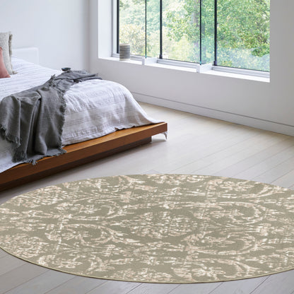 Beige circular rug with a subtle white abstract pattern in a bright minimalist bedroom with a low wooden platform bed.