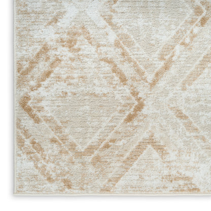 Cream rug with tan geometric diamond pattern and plush, textured pile.