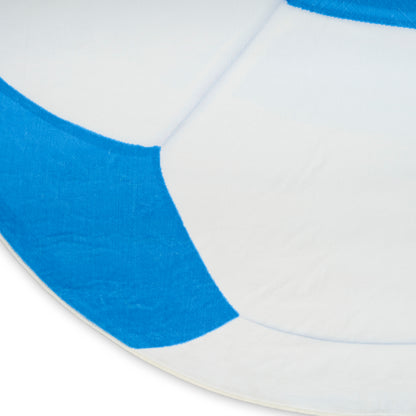 Round rug with blue and white color-blocked segments, plush pile, modern geometric design.