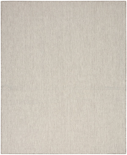 Beige woven fabric with tiny dotted texture and subtle speckled pattern.